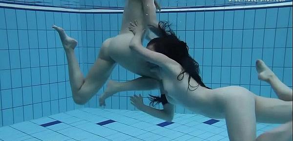  Two hot lesbians in the pool loving eachother